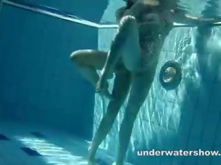 Zuzanna and lucie playing underwater